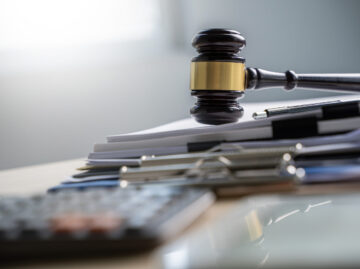 Judge and documents on office desk Legislation